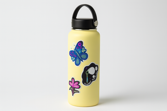 Tall pastel yellow Hydro Flask with 3 vinyl stickers - butterfly, bubbles, and flower